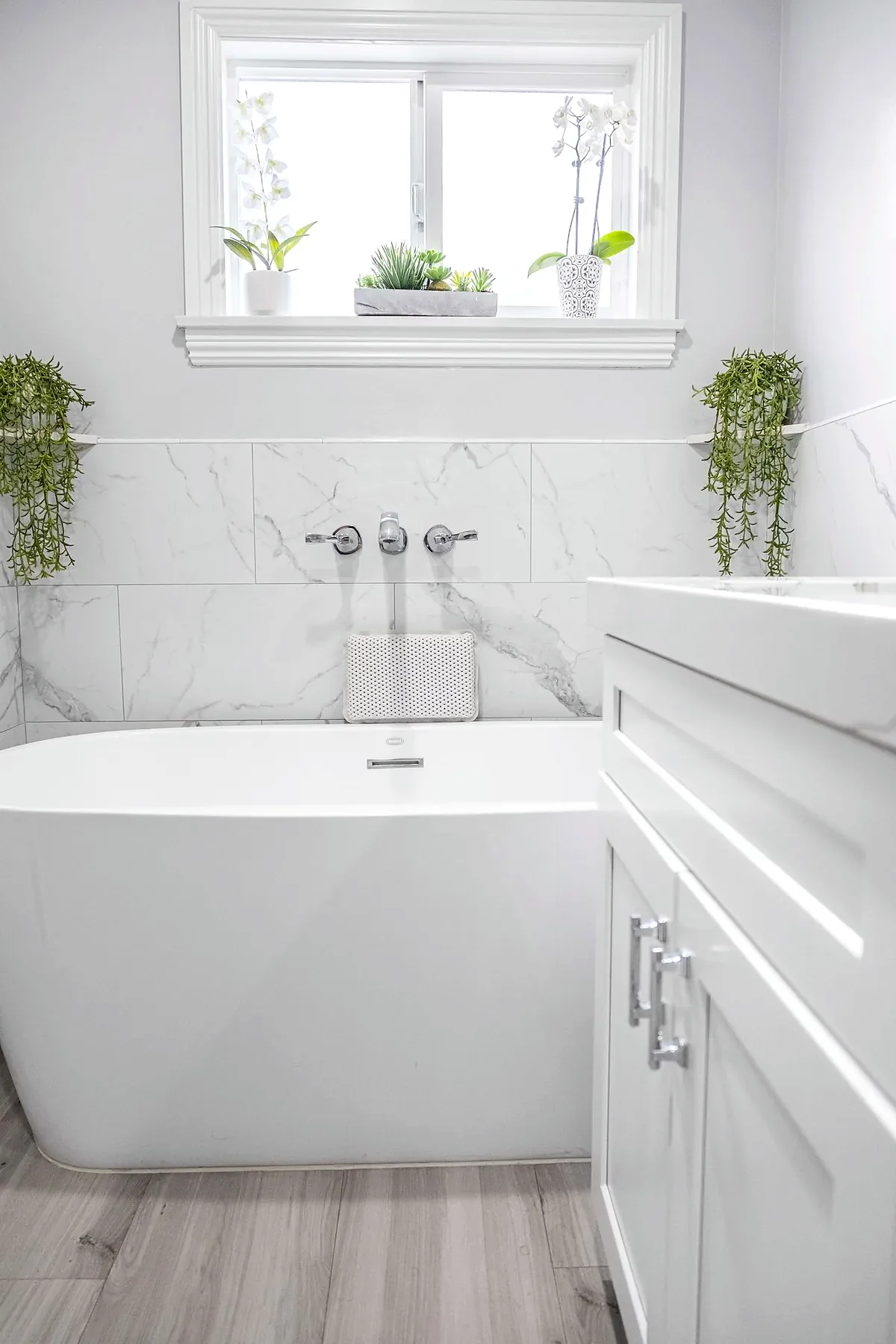 Completed bathroom remodel with tiled shower and new fixtures